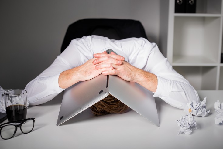 Man-upset-at-computer-fraud-digital-Shutterstock-for-editorial-use-only